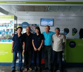 USSEC Vietnam Aquaculture Technical Manager Võ Hoàng Nguyên visits the INVE booth at the Vietshrimp International Fair