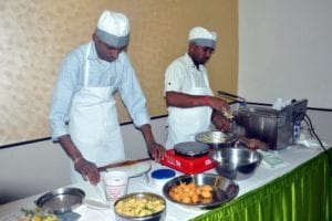 Chefs prepare soy fortified foods during a cooking demonstration in Ahmedabad