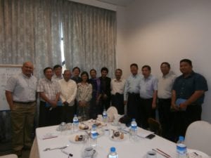 Peter Chen (third from the right) poses with workshop participants