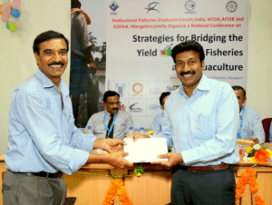 USSEC – Feed/ Soy Meal Program Director Dr. P. Emmanuel Vijay Anand (right) is recognized for his participation in the conference