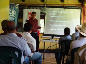 USSEC consultant Carlos Espinosa gives a presentation at a Guatemalan dairy farm