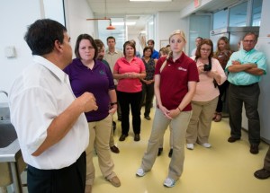 Sergio Serna Saldivar, head of ITESM’s center for protein research development, discusses his findings with a group during a recent USSEC tour of his labs (photo  courtesy of the Iowa Soybean Association’s Bean Blog)