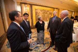 Members of the International Soy Growers Alliance talk before the start of the 2015 Forum on Biotechnology and Global Soy Trade last week in Beijing China. Pictured from left: Lloyd Day, Alex Utida, Laura Foell, Wade Cowan and Bob Haselwood.