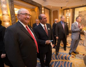 Rodolfo Rossi (left) and Pedro Vigneau greet dignitaries as they arrive for the beginning of the 2015 Forum on Biotechnology and Global Soy Trade last week in Beijing, China. A white paper was released at the meeting detailing the global implications of biotechnology approval delays to soy production, supply and demand.