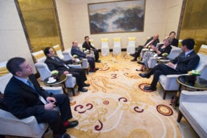 Rodolfo Rossi, Laura Foell and Aex Utida meet with Chinese government and industry leaders before the start of the 2015 Forum on Biotechnology and Global Soy Trade.