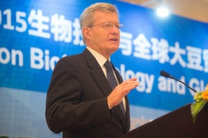 Max Baucus, U.S. Ambassador to China, addresses a crowd of about 100 people gathered for the 2015 Forum on Biotechnology and Global Soy Trade. 