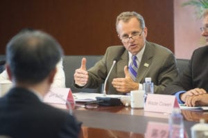 Jim Sutter, CEO of USSEC, discusses biotechnology trade issues with Chen Xuecong, Vice General Manager of Sino Grain, last week in Beijing. Members of the ISGA conducted personal meetings with top industry, education and government institutions to ask for their help in biotechnology approvals.