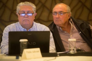 Pablo Adreani, a marketing consultant for USSEC, and Rodolfo Rossi, the director of Argentina Soybean Chain Association, look over ISGA documents during a meeting in Beijing, China. ISGA lobbied business, government and education leaders to expedite the approval process for soybeans.