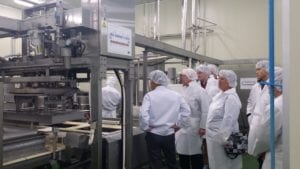 U.S. food-bean exporters and USSEC staff and Ms. Burrier observed the tofu production process in the tofu plant at Malgunsikpum, Inc.