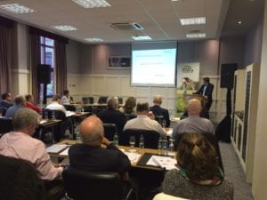 Dr. Rory Deverell of FC Stone International talks to seminar participants