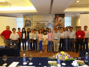 USSEC Vietnam Aquaculture Technical Managers in red shirts: Mr. Vo Hoang Nguyen (far left) and Dr. Nguyen Van Tien (far left), together with swine Technical Manager Dr. Basilisa Reas and USSEC Vietnam Country Manager Tran Trong Chien with participants at the seminar