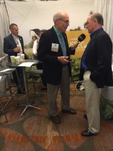 USSEC director Bob Metz (right) gives an interview about U.S. Soy exports at the Trade Talk event in Kansas City 