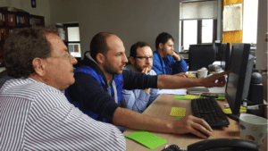 USSEC consultants Dr. Juan Acedo Rico and Dr. Pedro Medel discuss during field visits how to efficiently run a feed mill in today's increasingly competitive business environment