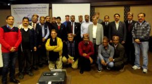 The USSEC team, along with officials and scientists from the Fisheries Department and Palampur University are greeted with a traditional cap worn in India's mountainous regions