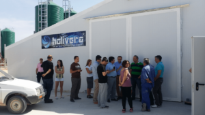 The international group visits a newly built broiler house at Caceres