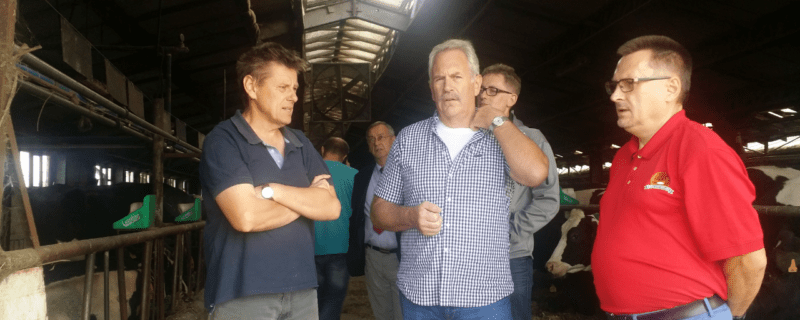 Dr. Lynn Davis (second from right), with language help from Jerzy Kosieradzki (right), worked on the feeding of high producing dairy cows with managers P. Wnuk and M. Zaremba and Etos nutrition advisors at RSP Bądecz