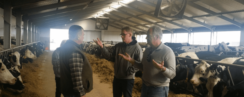Andrzej Jaworowicz (owner and managing director at Godziątków dairy farm, first from left, was one of the most diligent trainees at the program; Dr. Lynn Davis (first from right) discussed with him the many aspects of a successful dairy cow nutrition program