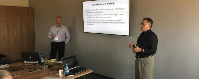 Dr. Lynn Davis (left) shared information on many practical issues, including the consequences of some nutritional and managerial mistakes in overall farm production efficiency and profitability; consecutive translation was provided by Jerzy W. Kosieradzki, USSEC Technical Director, Northeast Europe (right)