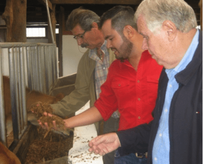 USSEC consultants Carlos Campabadal and Carlos Espinosa provide technical assistance to dairy producers
