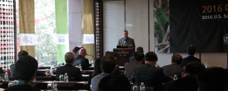 North Dakota Soybean Council director Perry Ostmo gives welcome remarks at the conference