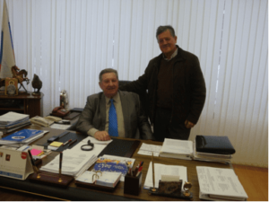 Dr. Mateos (right) with Mr. Fisinin (left)
