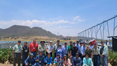 Group of people at an aquaculture facility