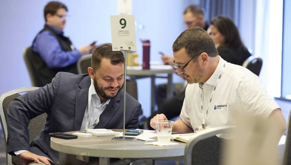 People interacting at a USSEC industry event