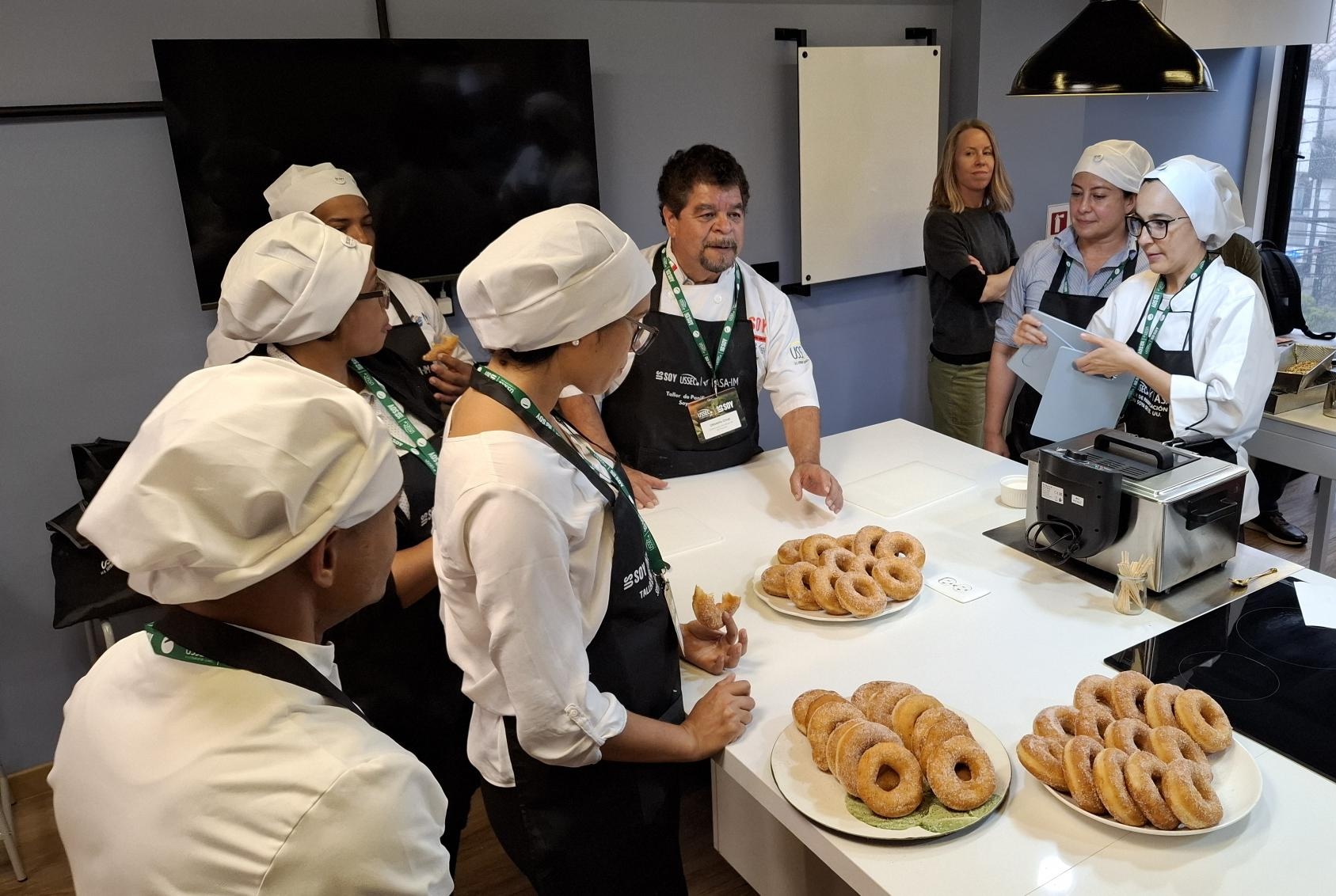group of people in a bakery